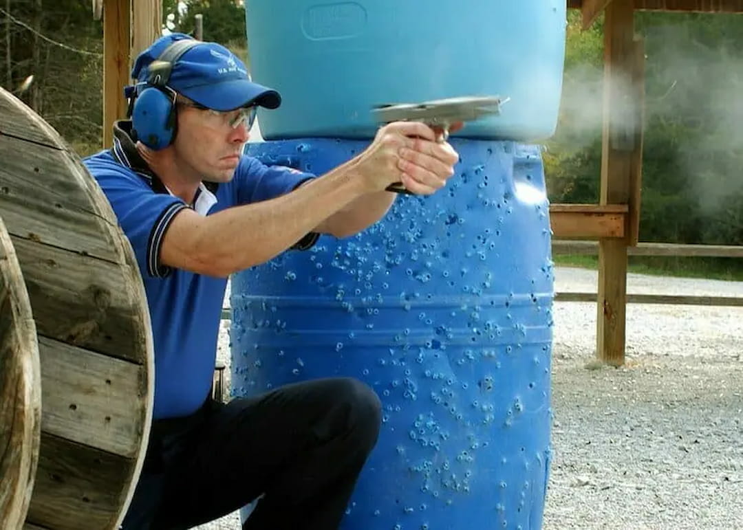 A person with blue hat shooting