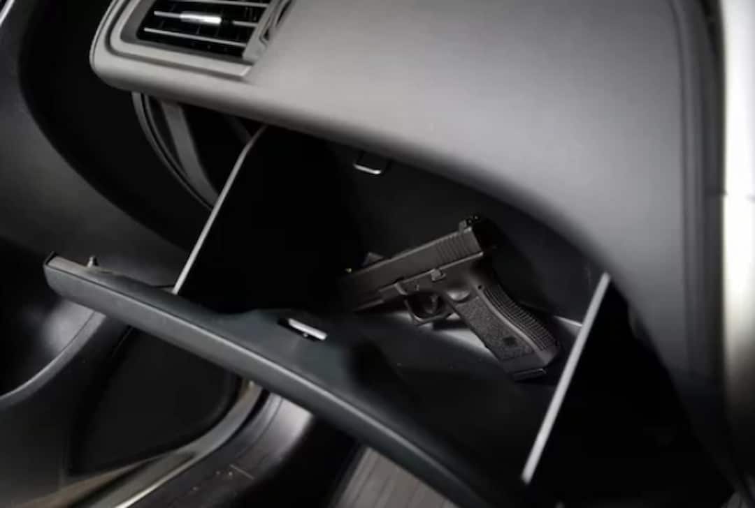 a gun in a cartridge in the car