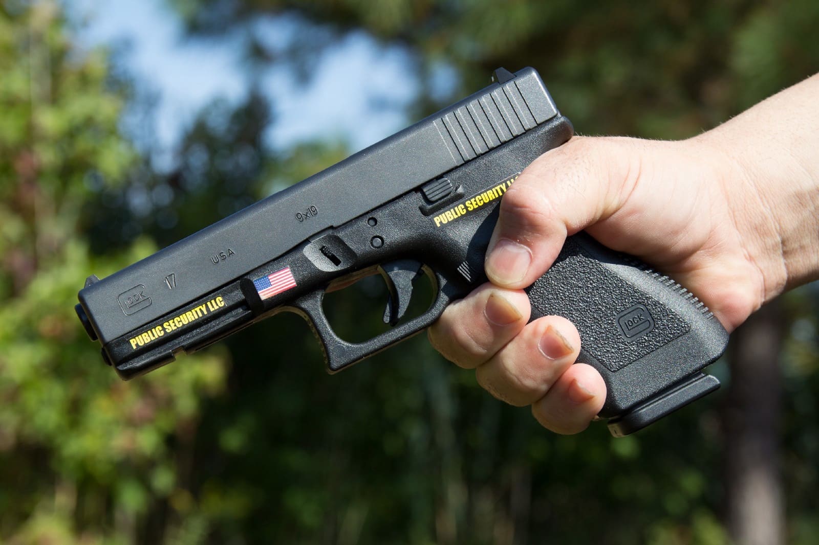 Glock pistol in a person's hand