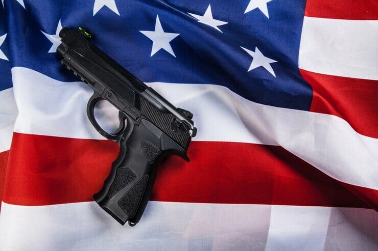 a flag and a handgun