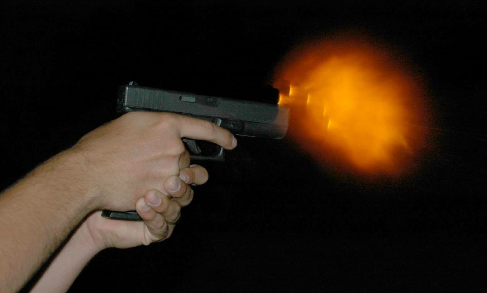 a person shooting with Glock 17