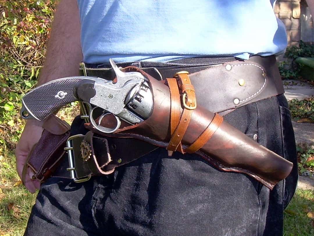closeup of a handgun in a gun holster