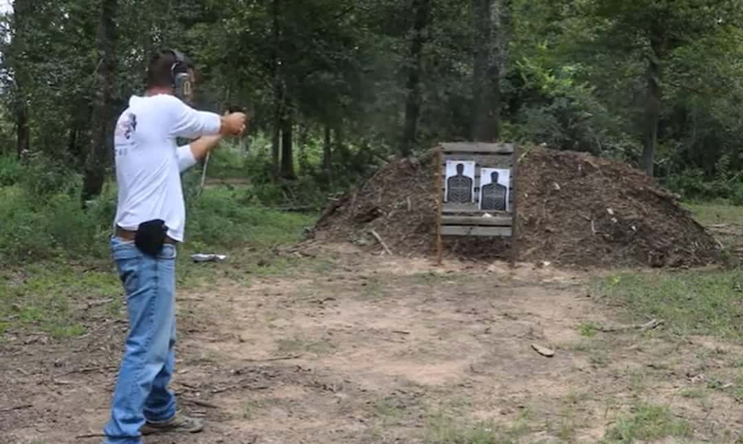 a person shooting at the shooting range