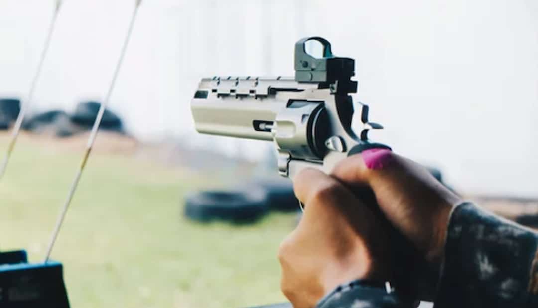 a person shooting at the gun range