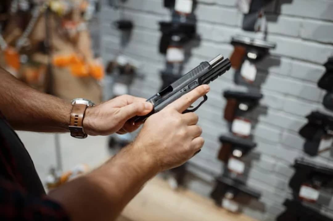 a person in the gun store