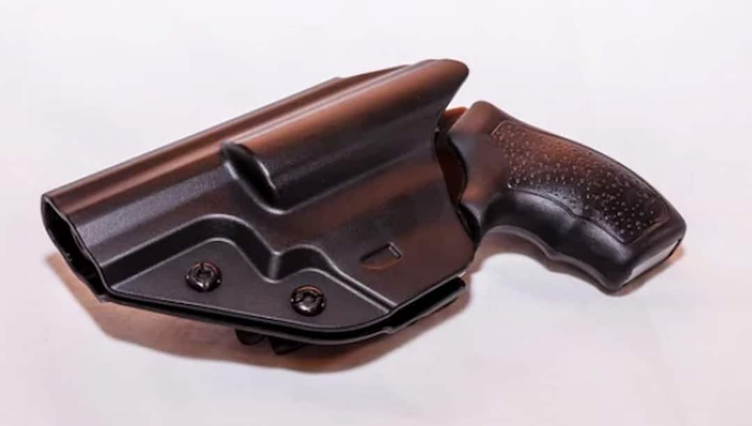 a gun in a black holster