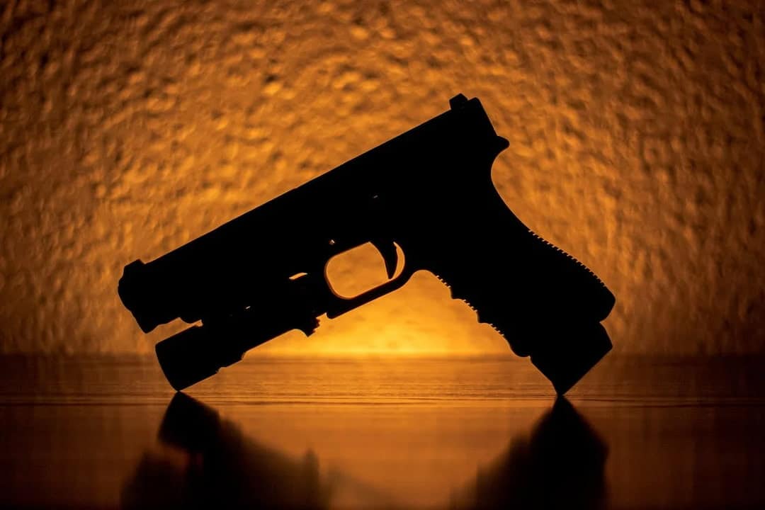a pistol and its shadow