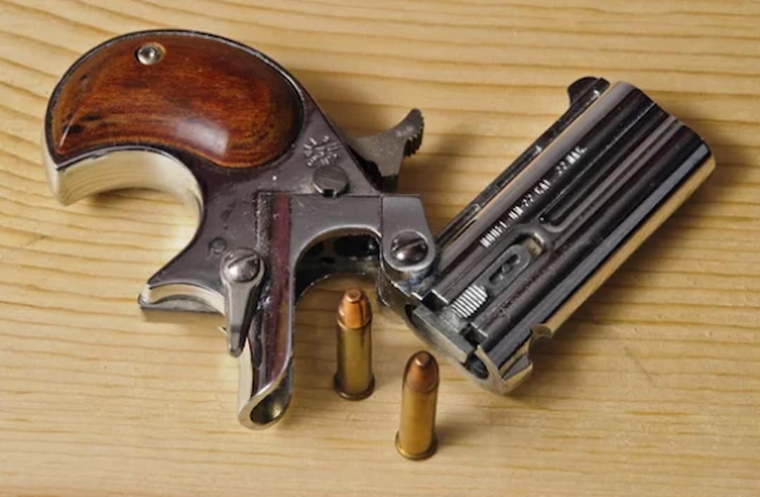 a handgun and bullets