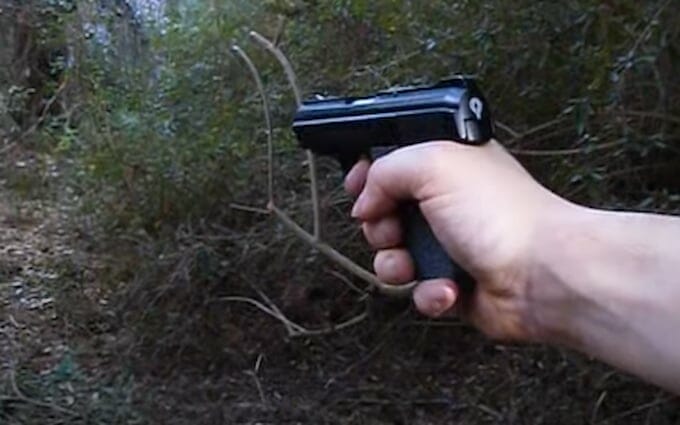 a person holding a gun