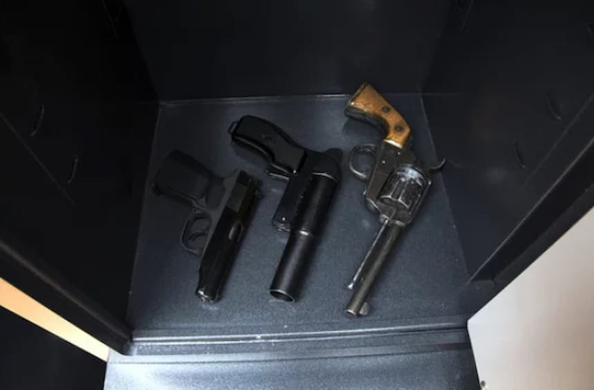 3 handguns in the safe
