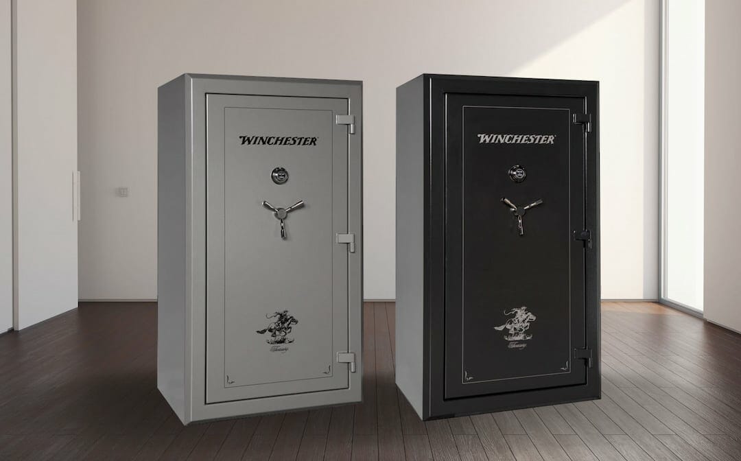 a black and a white safe by Winchester