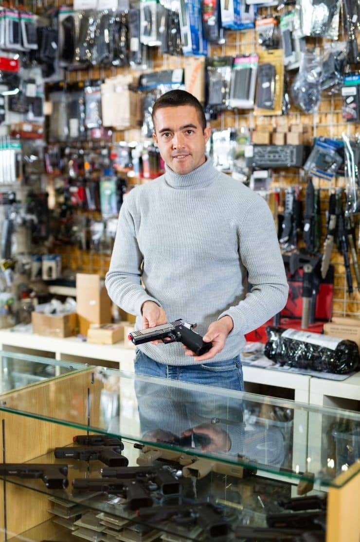 A man in a handgun store